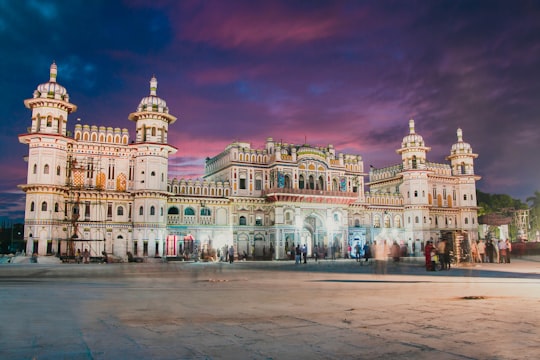 white and brown concrete building during night time in Shree Ram Janaki Mandir Nepal