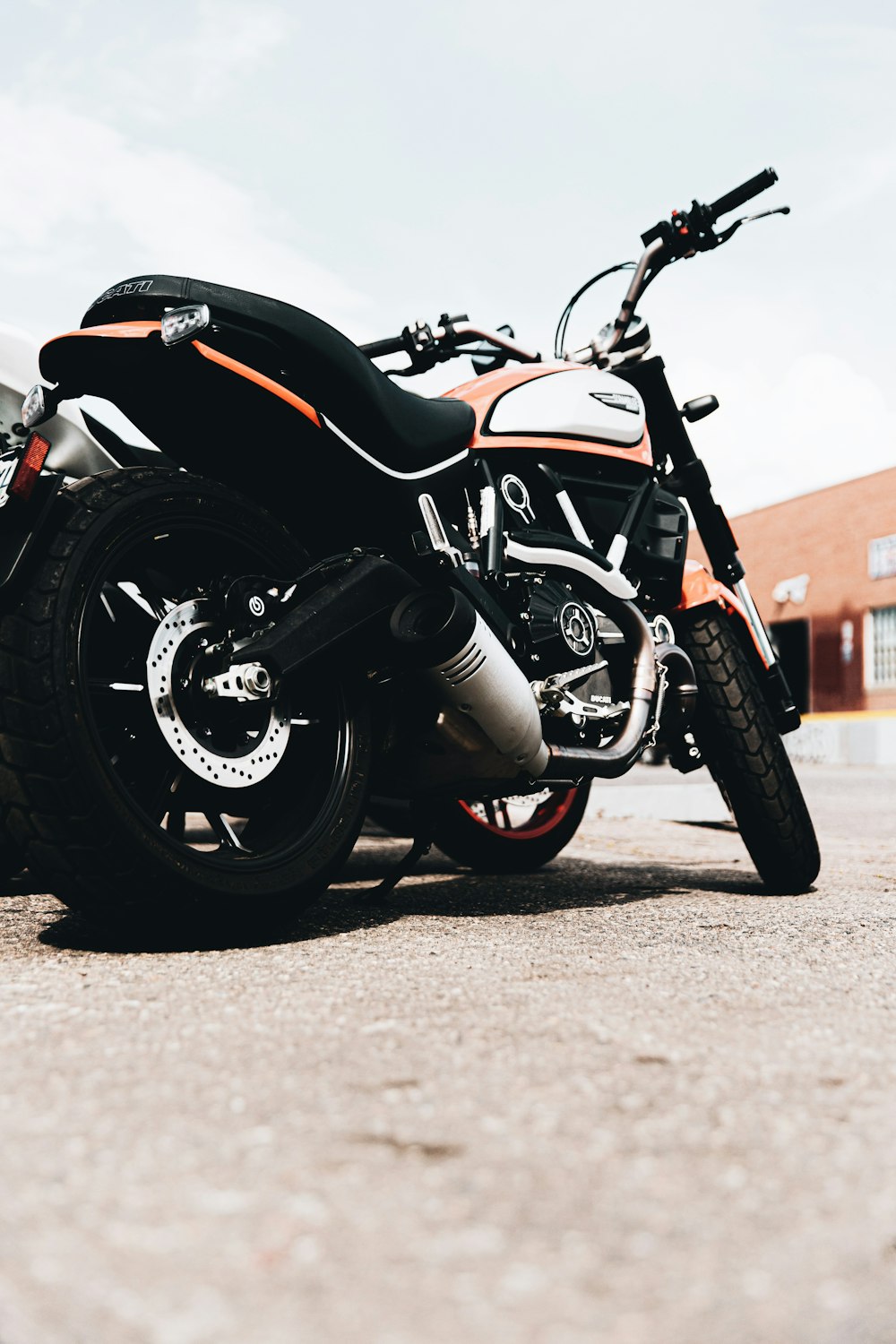 black and orange sports bike