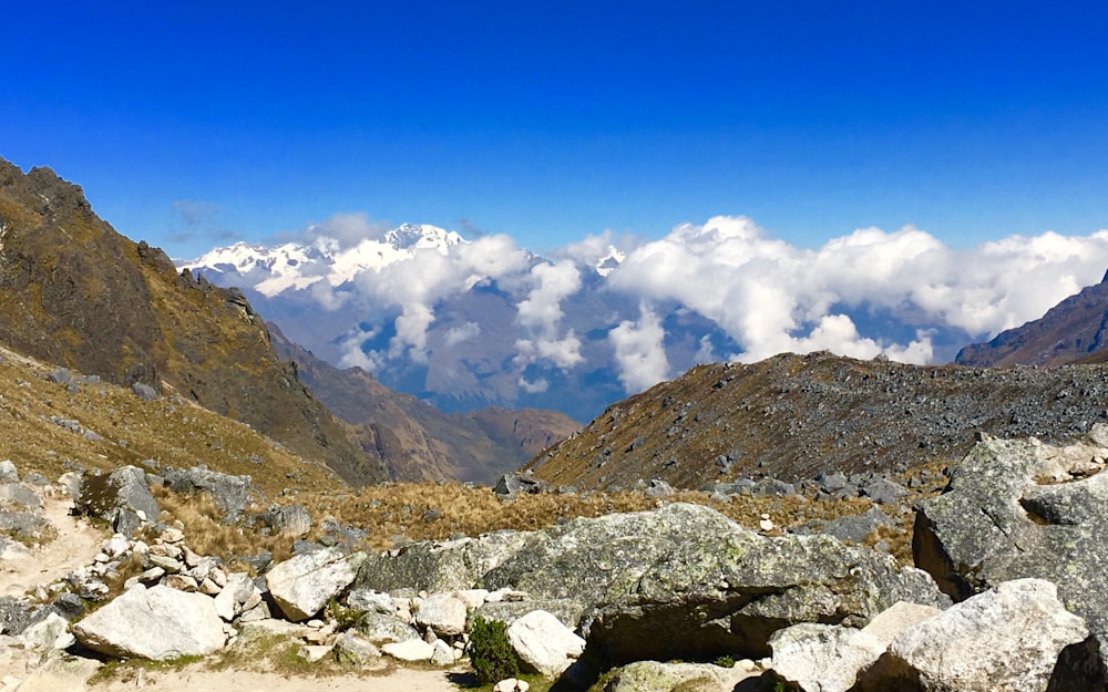 brown and green mountains under blue sky during daytime