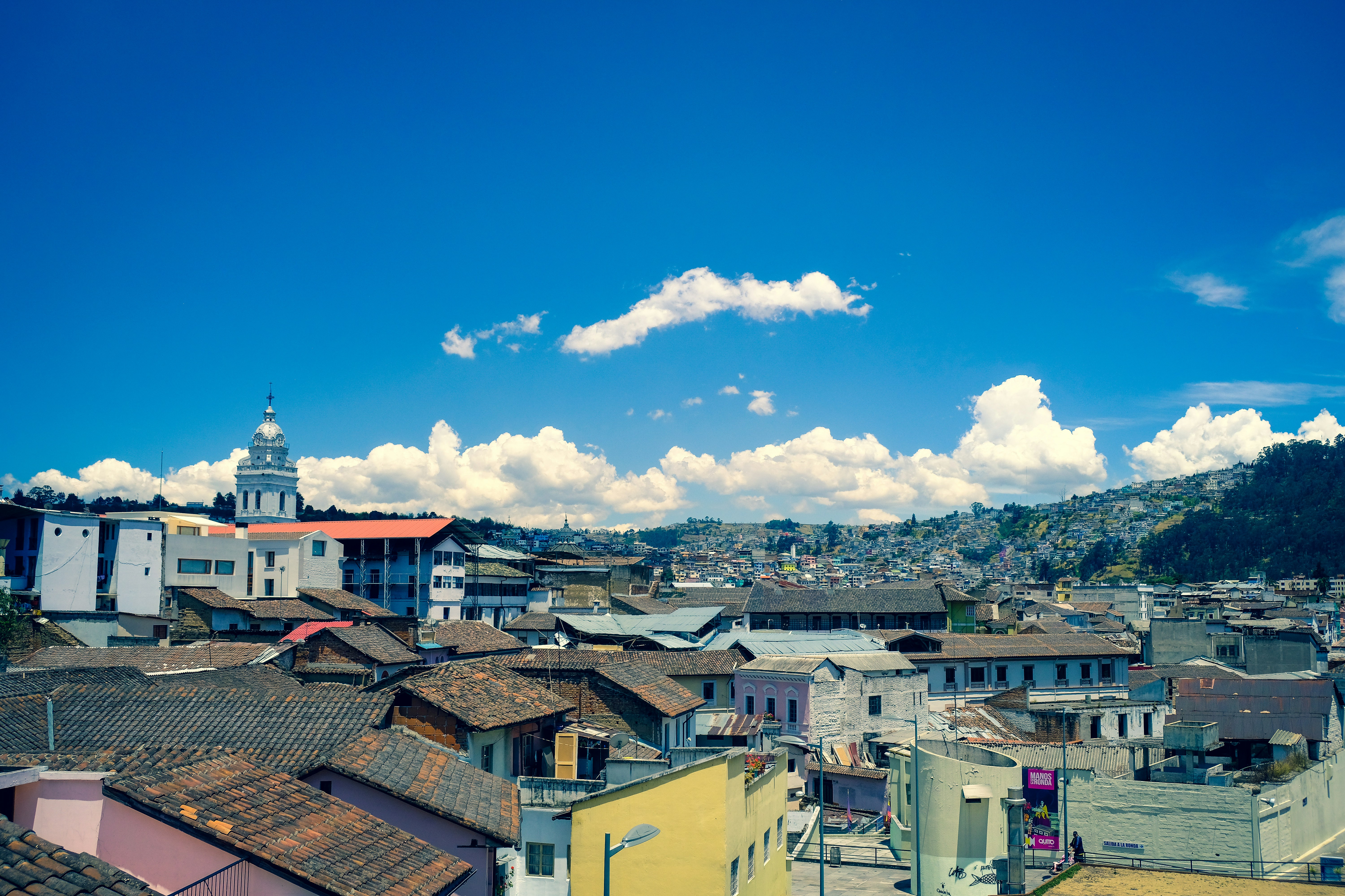 white and brown concrete buildings under blue sky during daytime