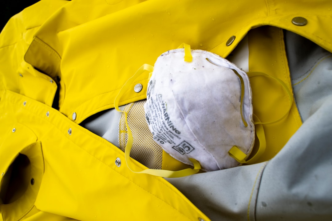 white helmet on yellow textile