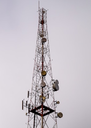 orange and white tower crane