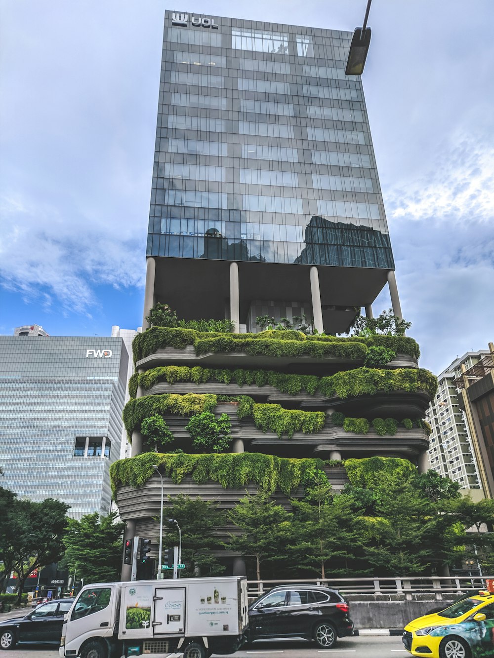 green and gray concrete building under blue sky during daytime