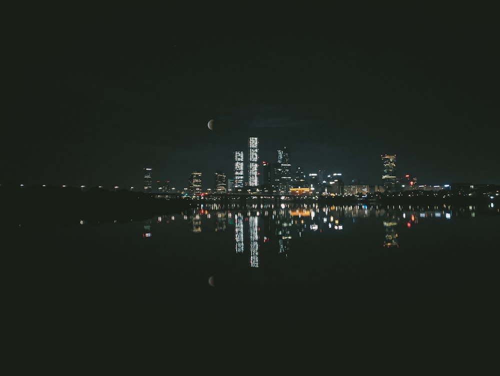 city skyline during night time