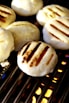 white and brown pastry on black tray