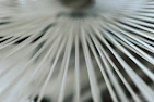 Close-up of a smart electric fan with minimalist design in motion
