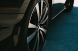 A close-up of a polished wheel and tire.