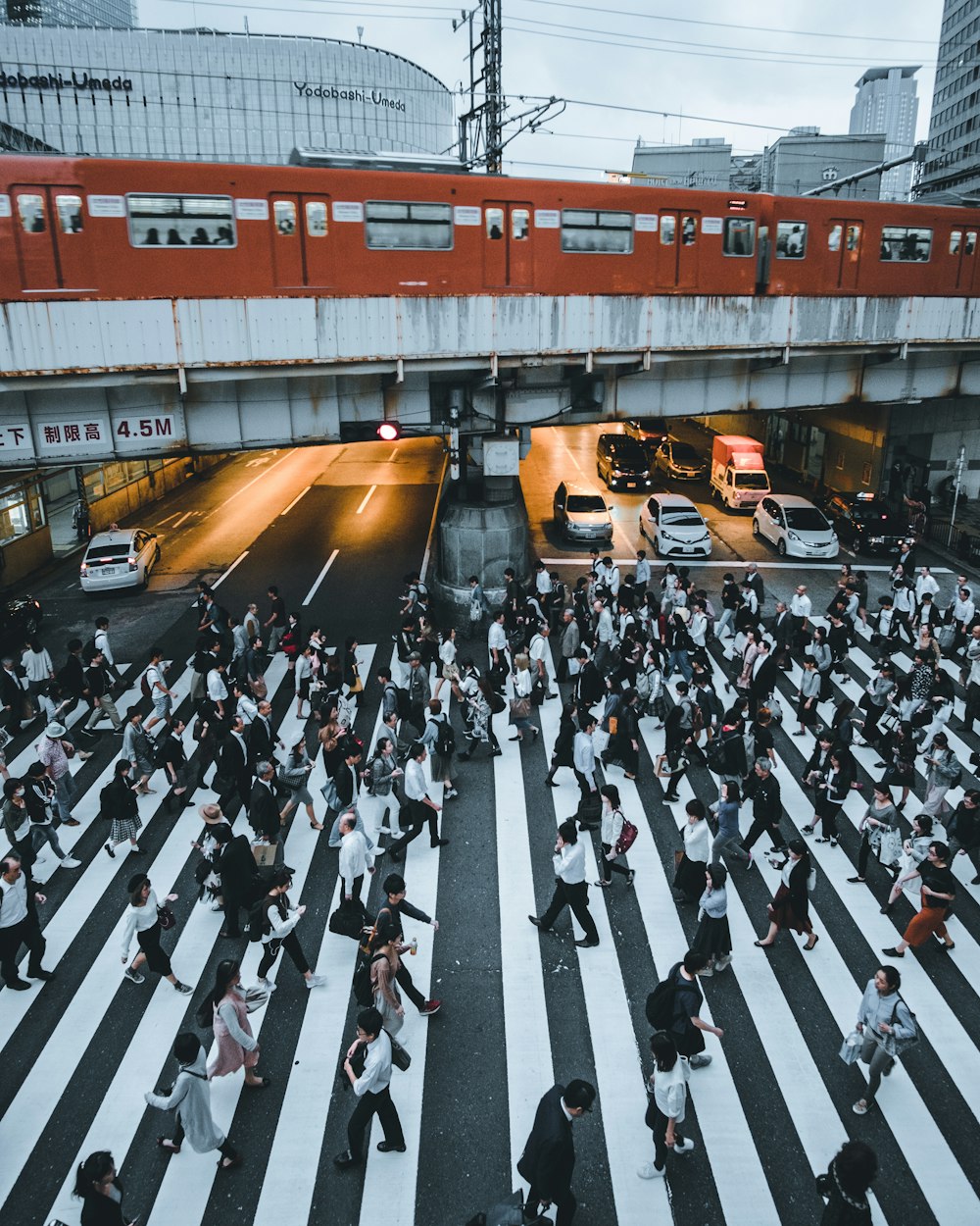 people in black suit standing on the street during daytime