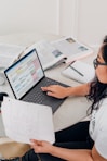 woman in white shirt using Microsoft Surface Laptop 3 in Platinum 
