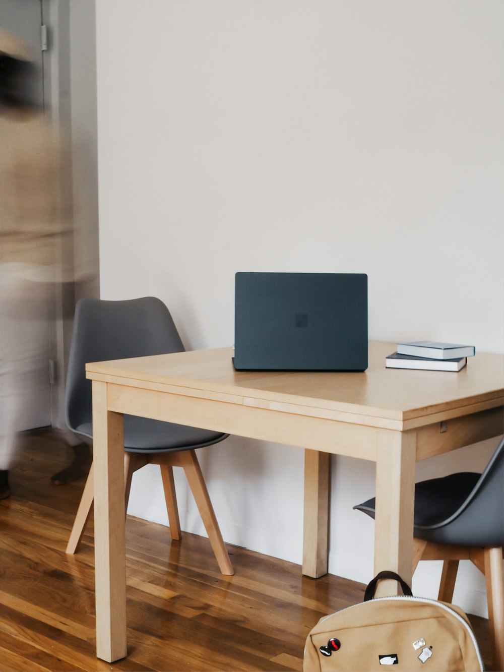 coblat blue Microsoft surface laptop computer on wooden table