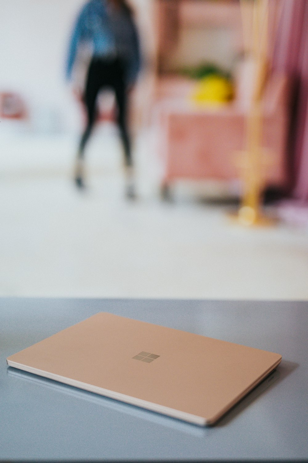 Microsoft Surface laptop on gray table