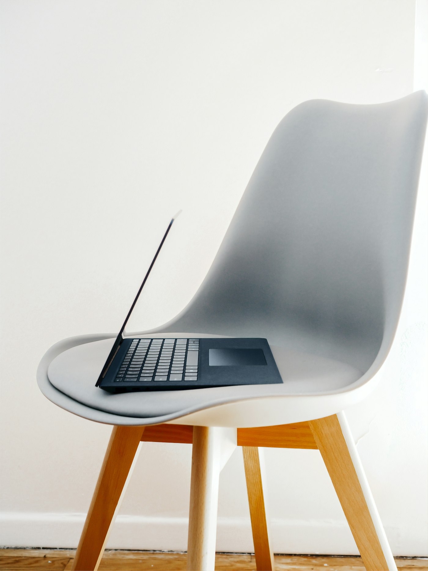 Online Degree vs Professional Certification，Adult student studying online with laptop and notebook