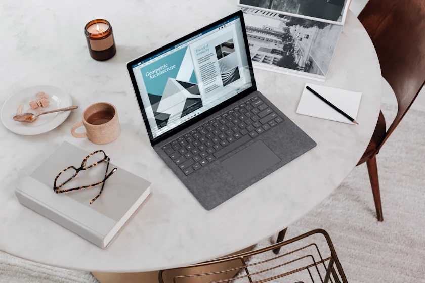 Person typing on a laptop keyboard