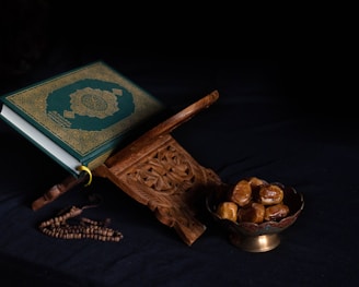 blue book beside brown wooden stick