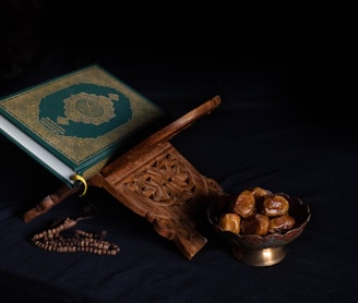 blue book beside brown wooden stick