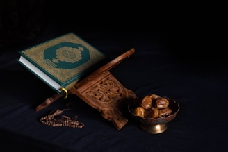 blue book beside brown wooden stick