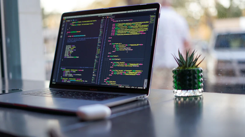 Student learning coding fundamentals on a laptop