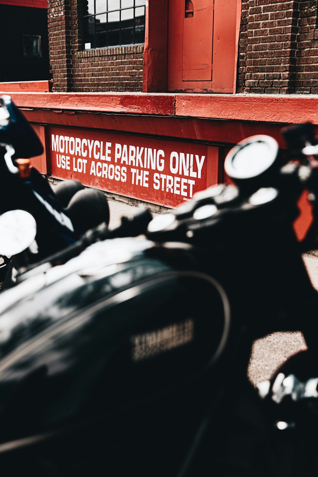 man in black jacket riding motorcycle