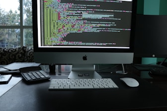 Workspace with a computer running office productivity software