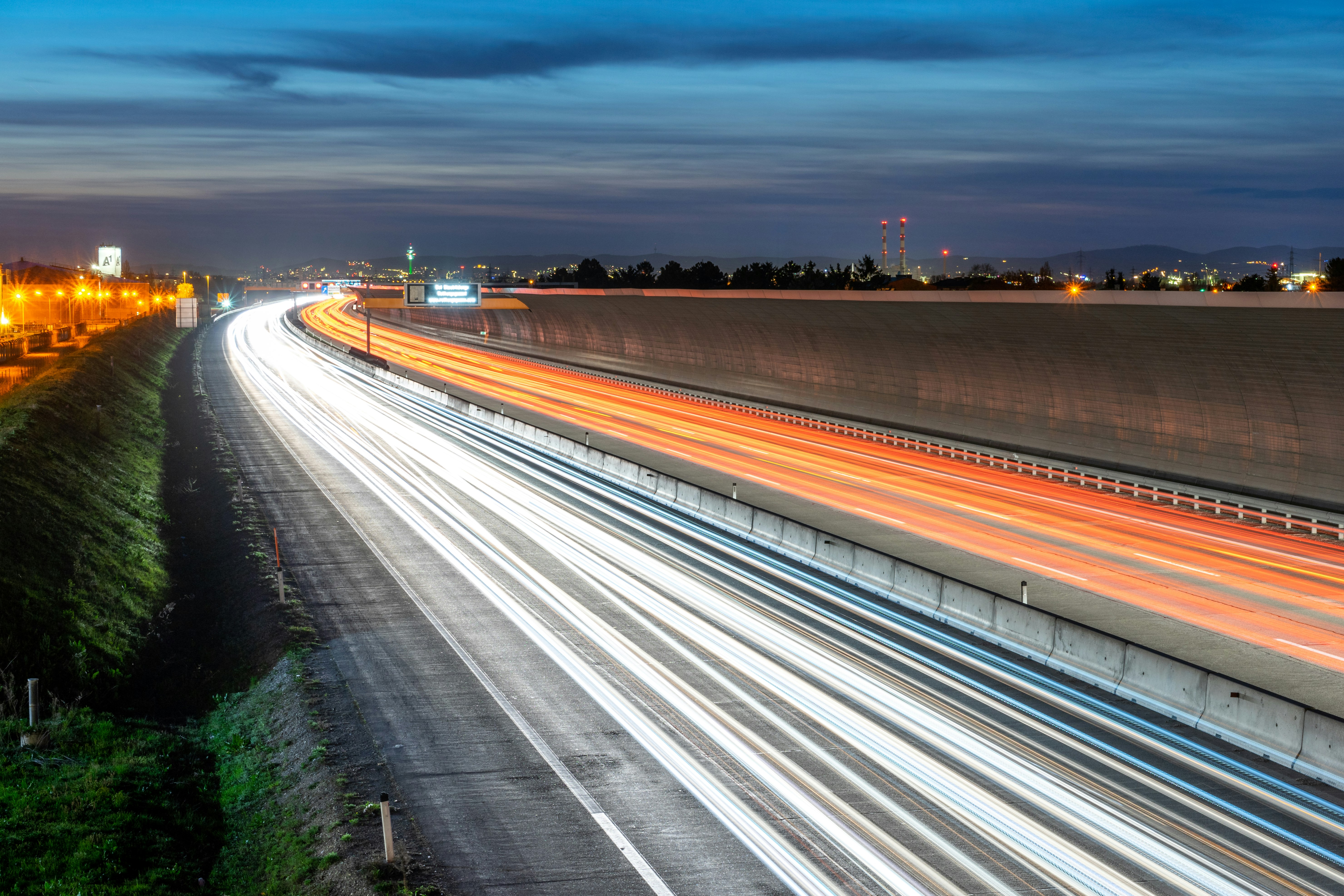 time lapse photography of cars on road during night time