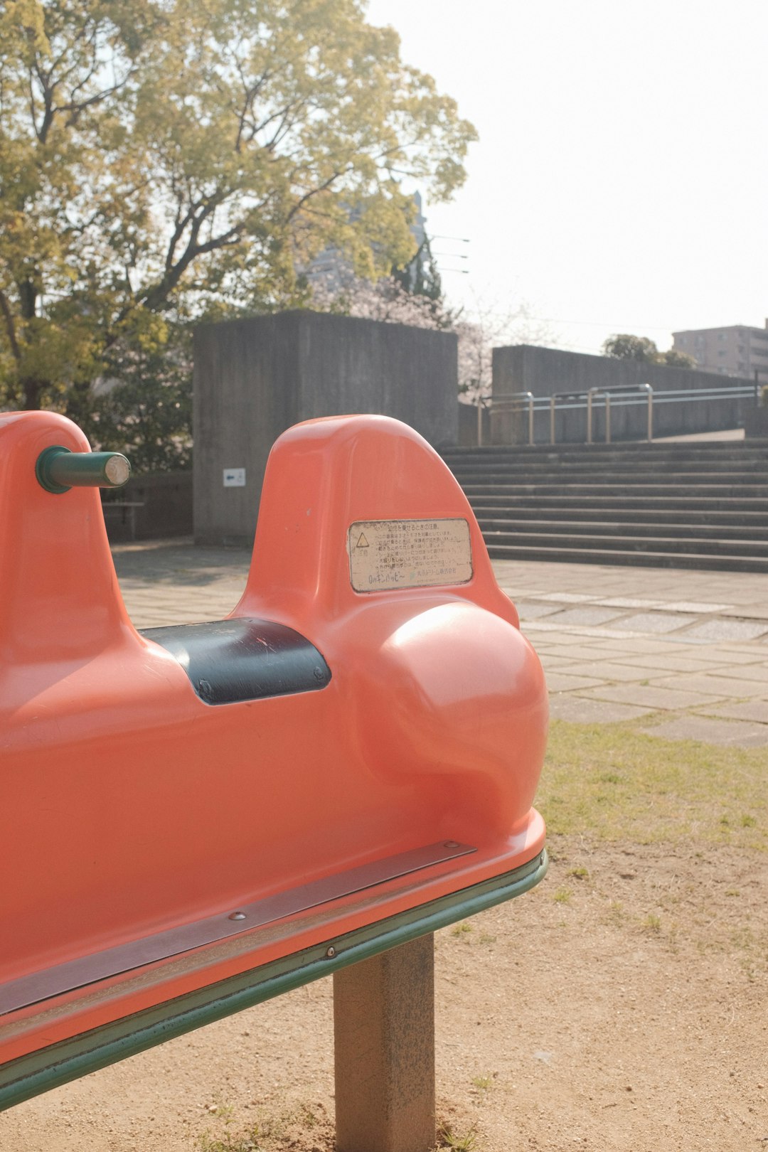 red and white plastic ride on toy car