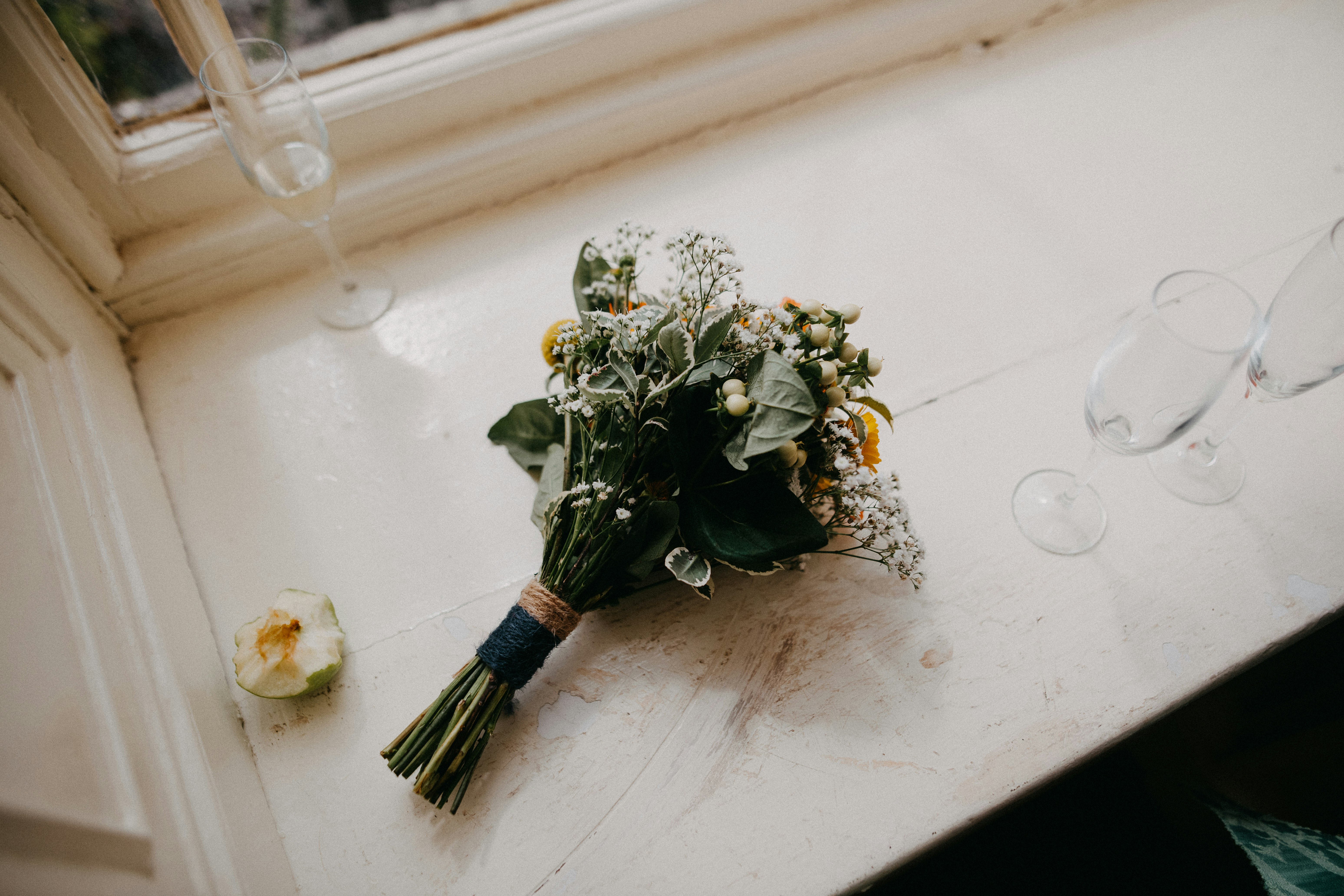 bouquet of white roses on white table