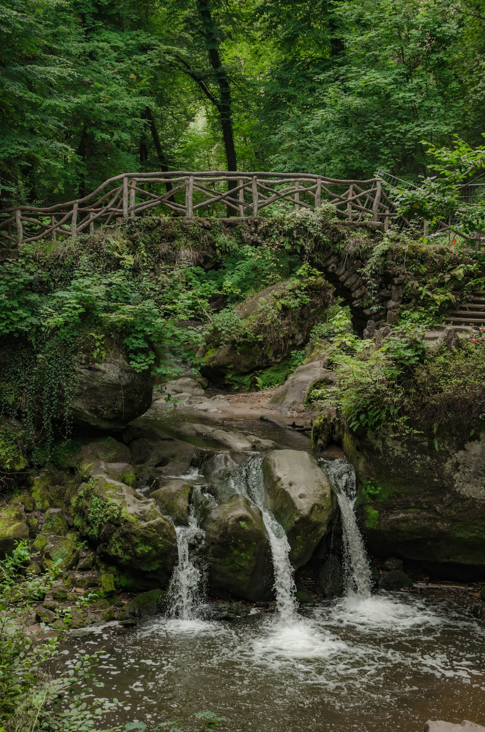 gray metal bridge over river