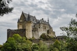 grey concrete castle under grey sky