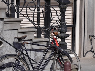 a bicycle parked on the side of a building