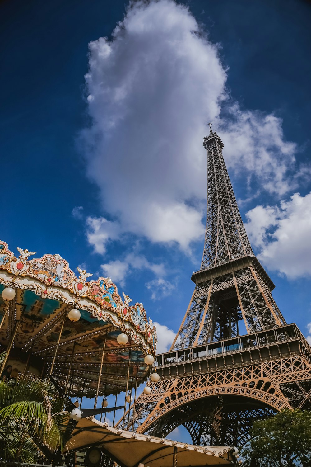 white and brown carousel under blue sky during daytime