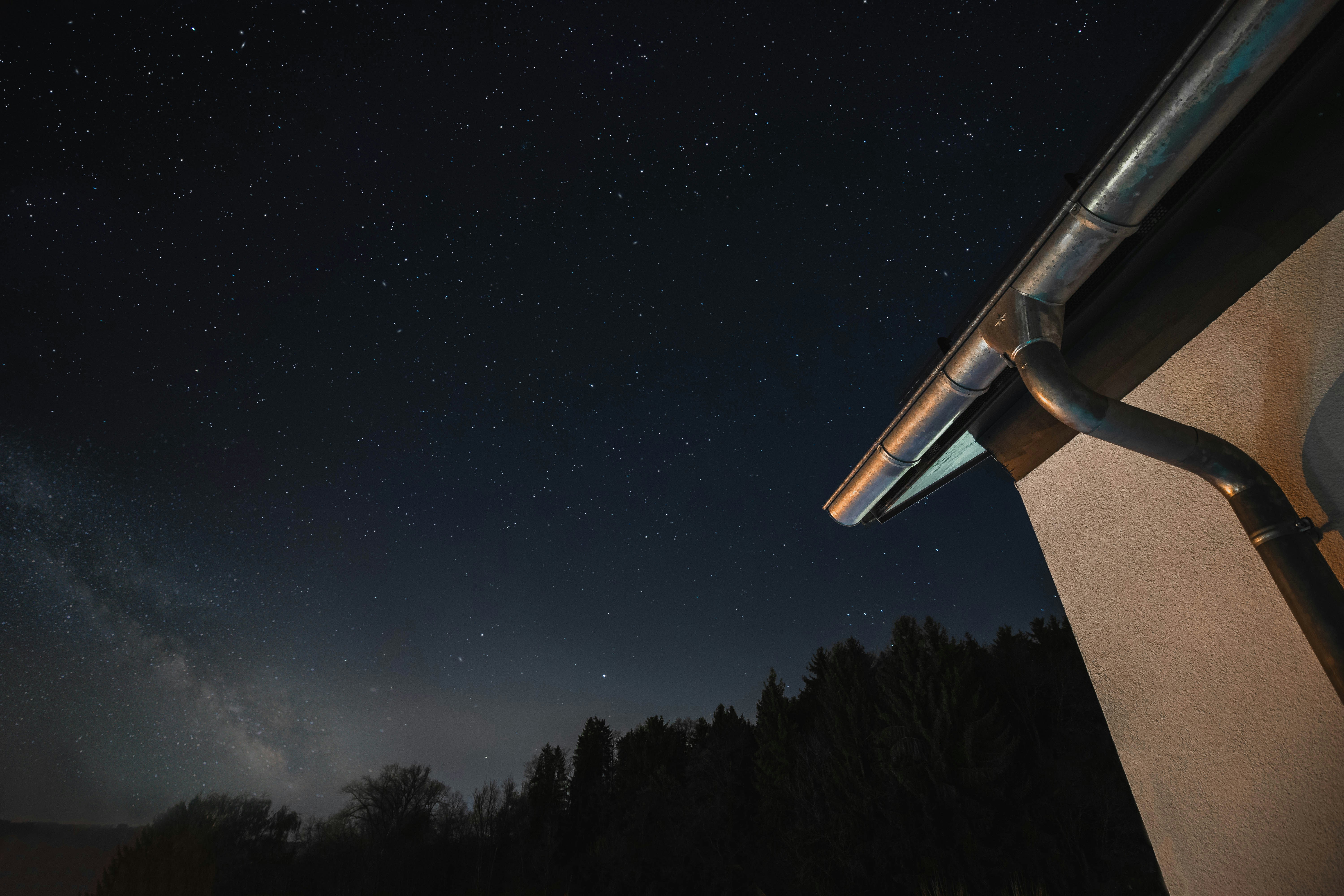 white and brown building under starry night