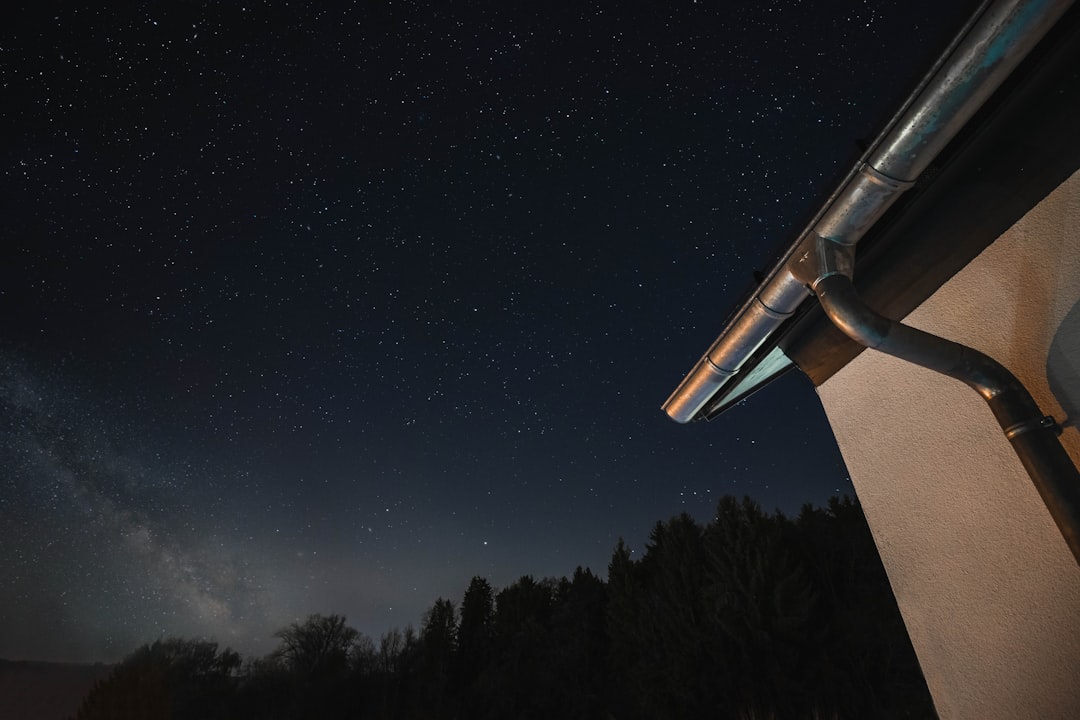 white and brown building under starry night