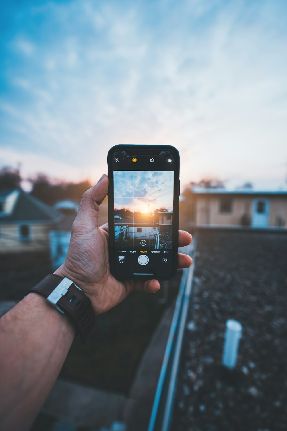 person holding black iphone 4