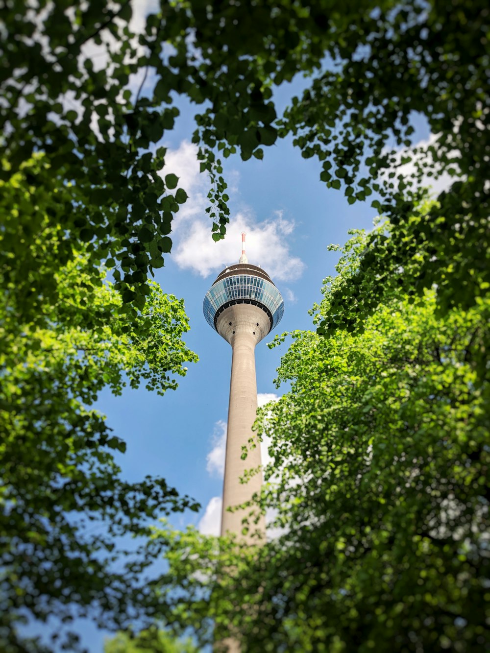 white concrete tower under blue sky during daytime