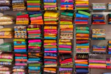 A vibrant display of colorful textiles arranged neatly.