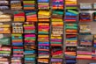 Close-up of colorful folded clothes on display