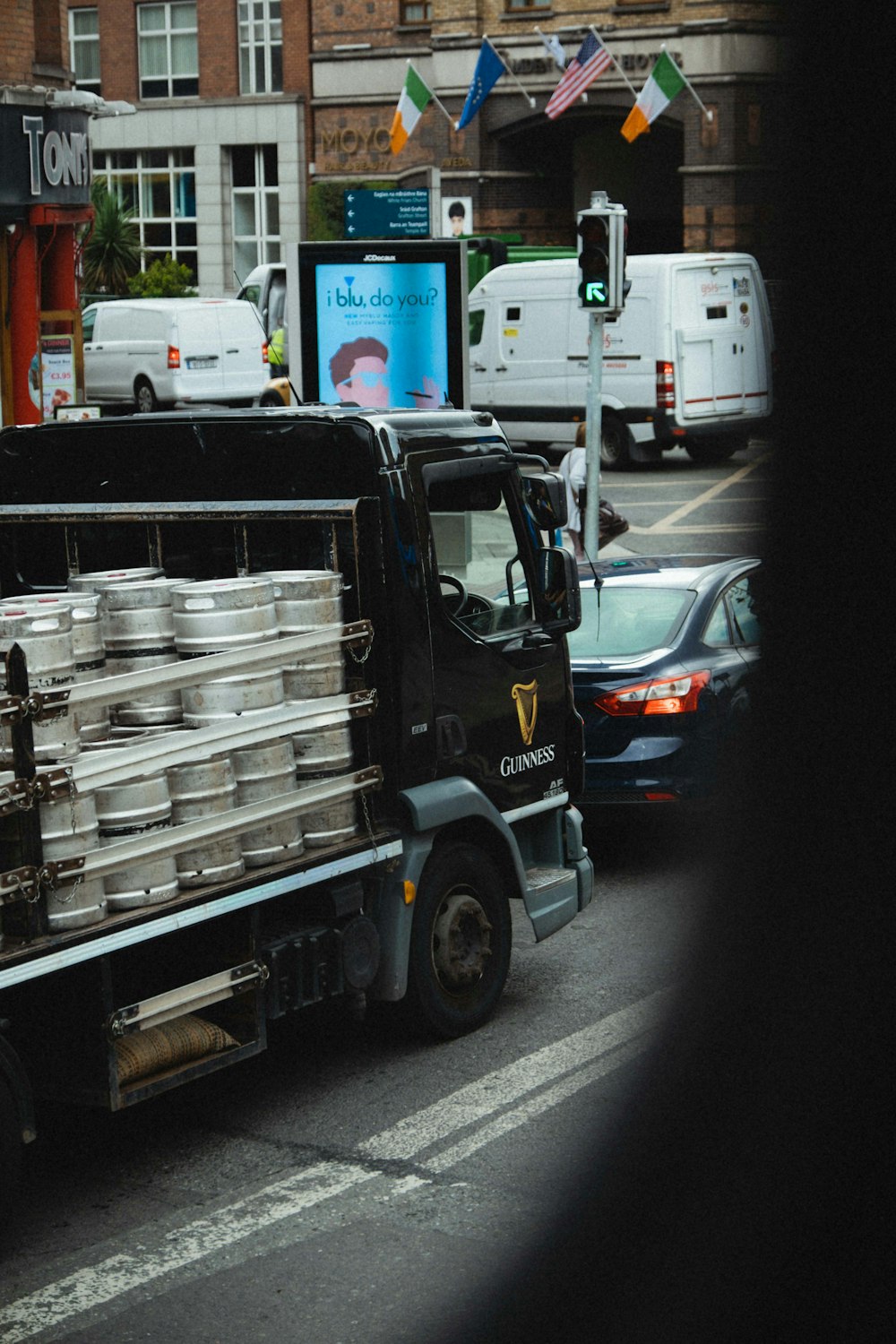 white and black truck on road during daytime