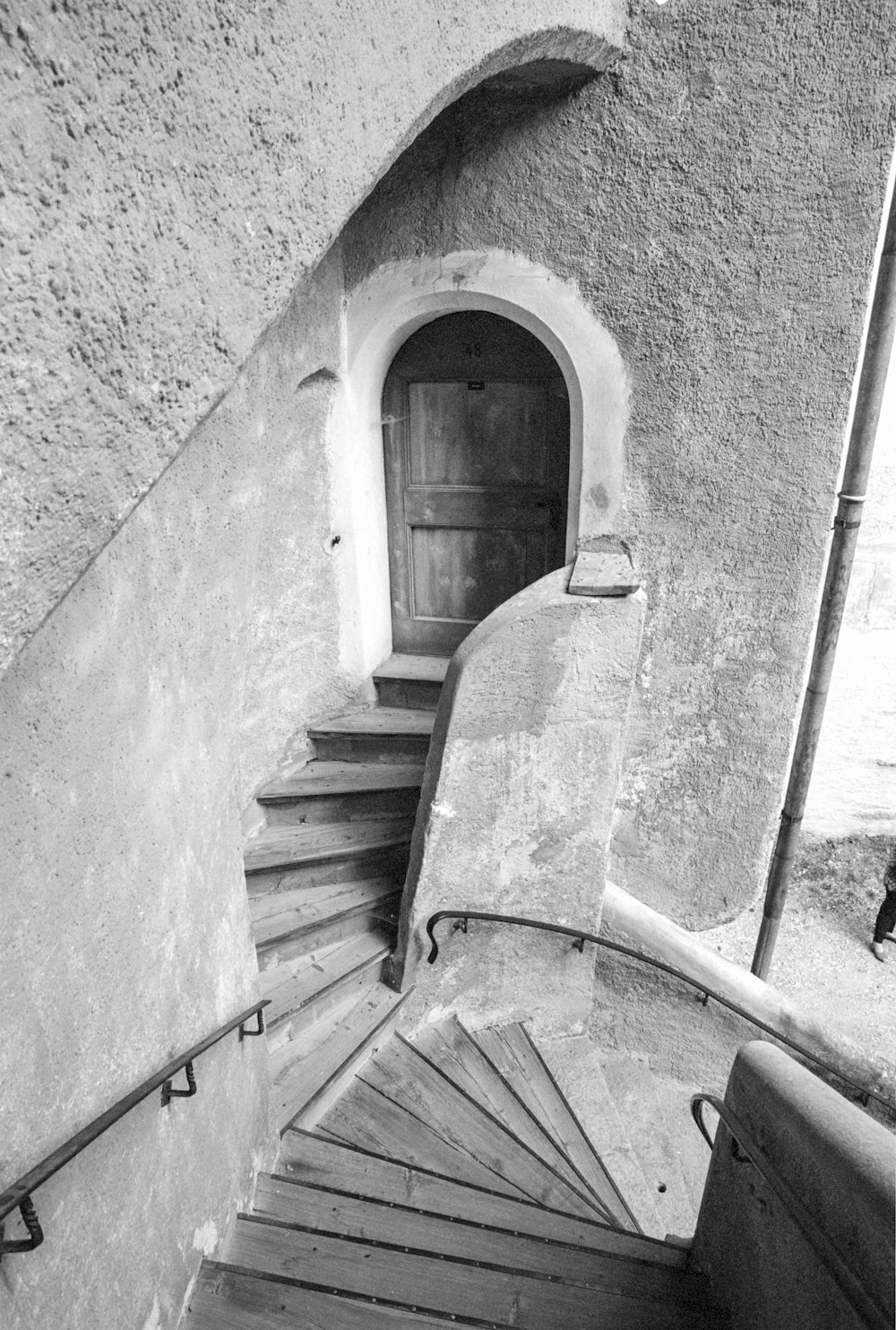 grayscale photo of concrete stairs