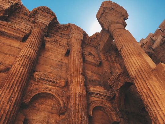 brown concrete building under blue sky during daytime in Baalbek Lebanon