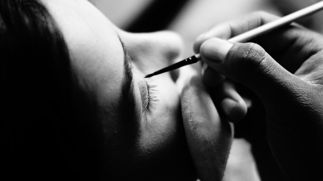grayscale photo of person smoking, Eyeliners
