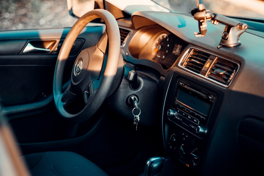 black and gray car steering wheel