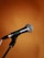 black and gray microphone on microphone stand