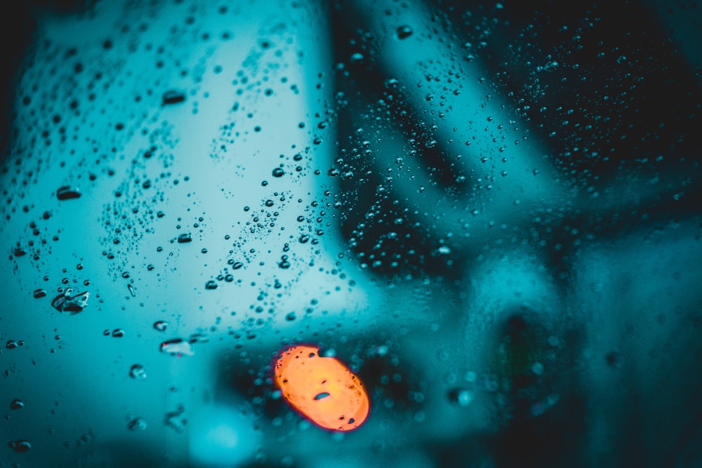 water droplets on glass during daytime