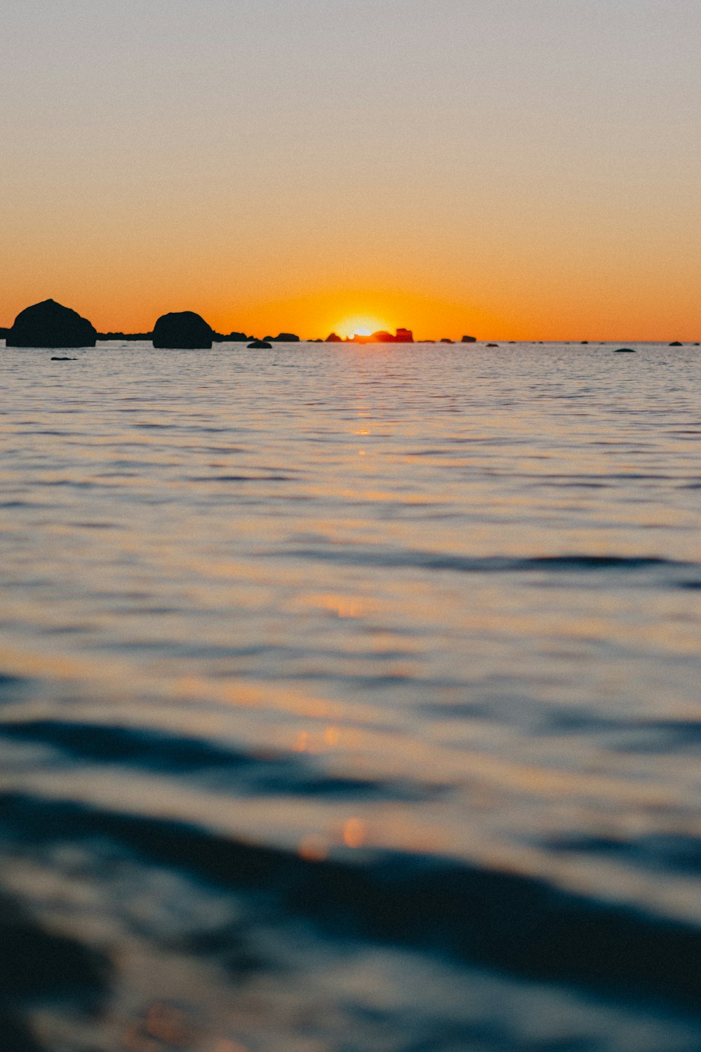 silhouette of mountain during sunset