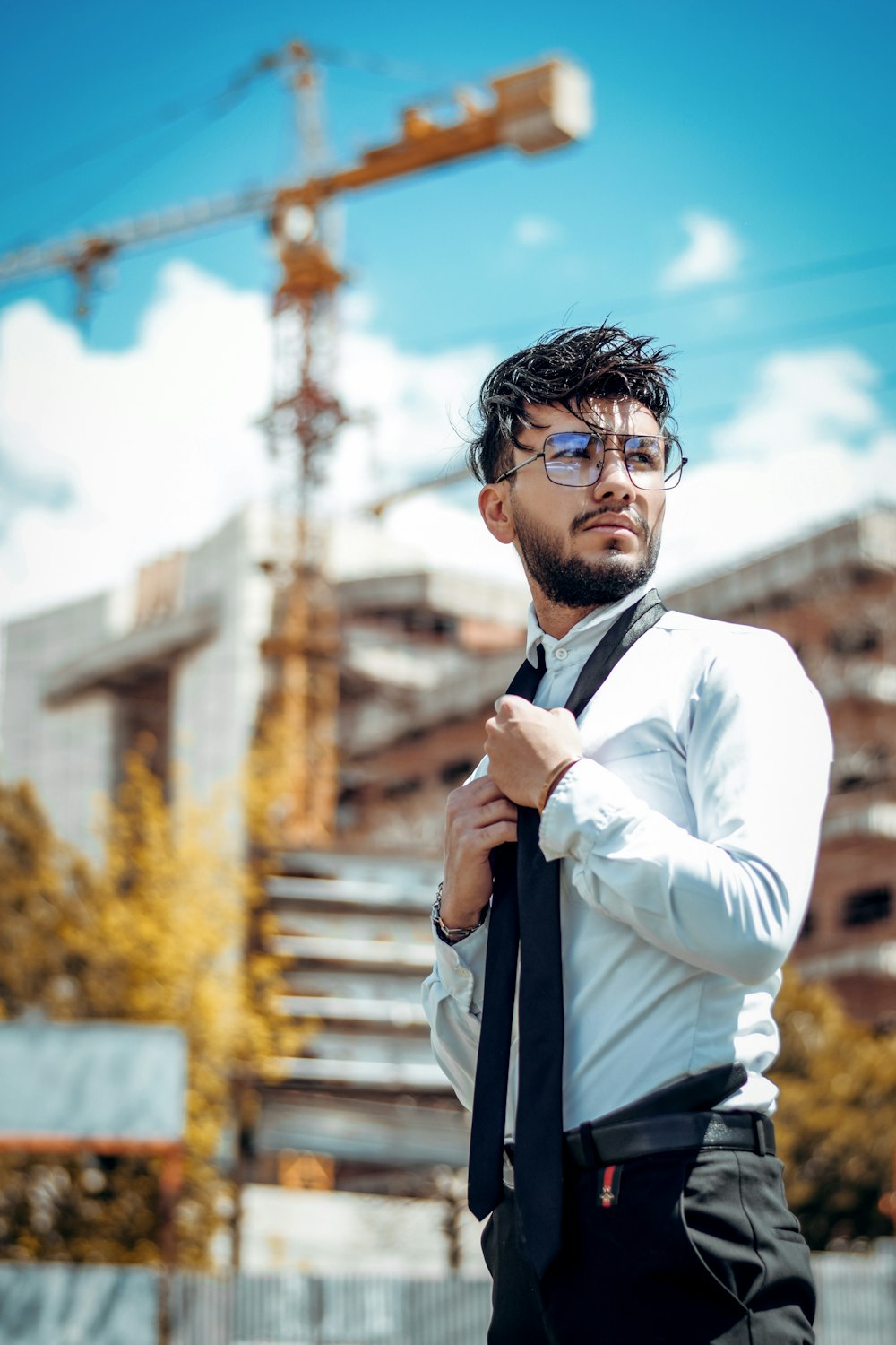 man in white dress shirt wearing black framed eyeglasses