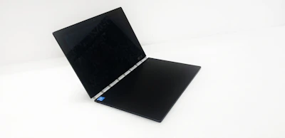 A 360-degree virtual tour interface displayed on a sleek laptop screen.