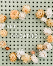 happy birthday with white and yellow flowers