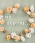 photo of the words And Breathe and flowers around it