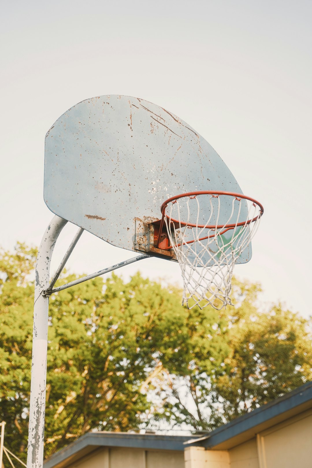 white basketball hoop with yellow net