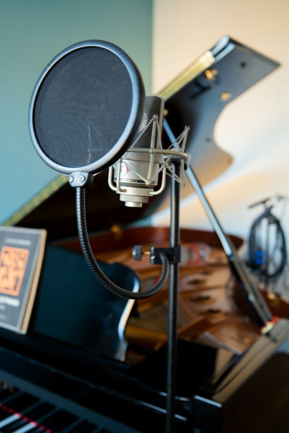 black and silver microphone on black table